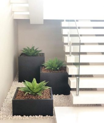 Decorative gravel under the stairs