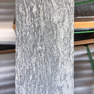 Wooden veins granite flamed surface 