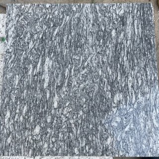 Wooden veins granite polished surface